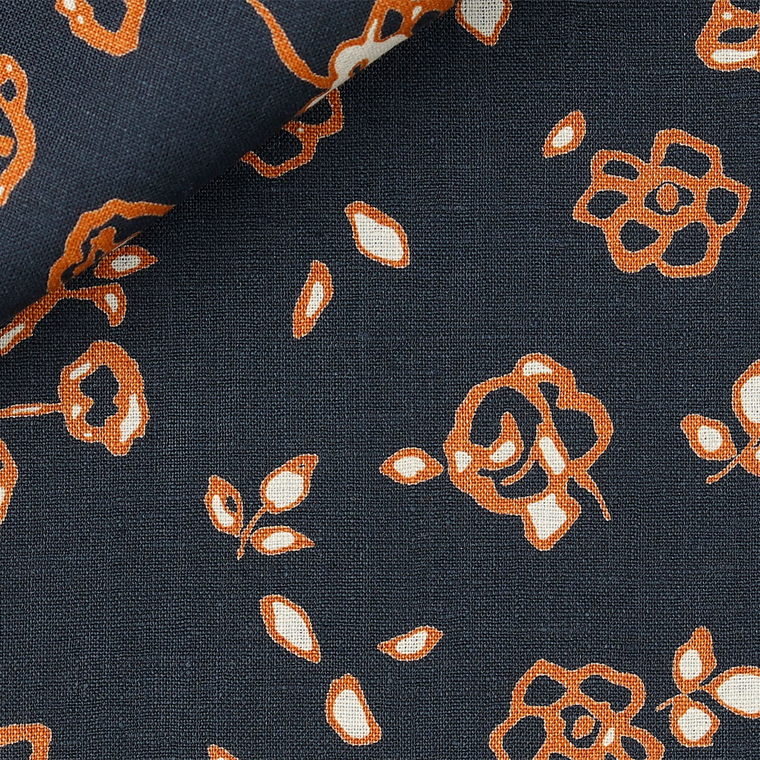 Cotonificio Albini fabric with brown flower pattern on dark blue background