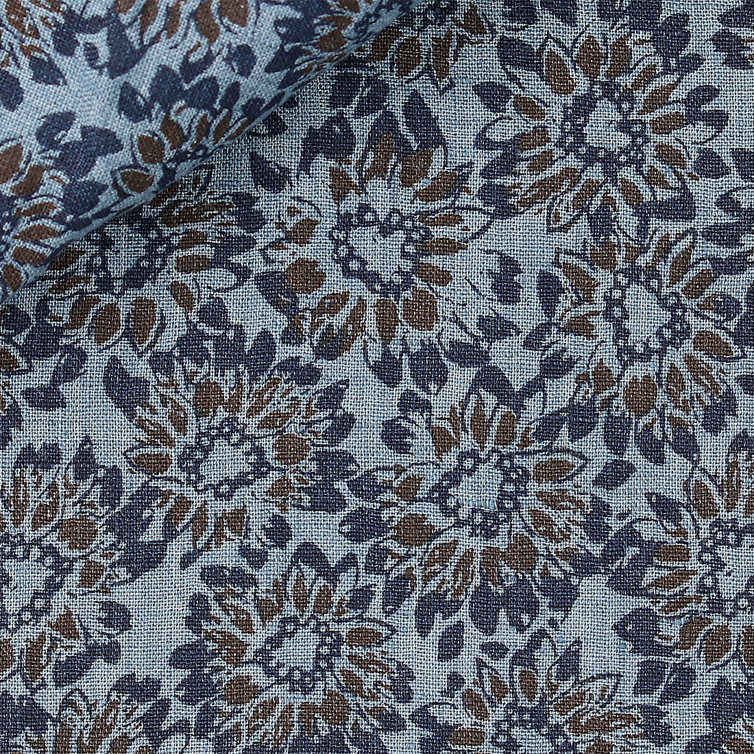 100% linen fabric with dark blue and brown floral pattern