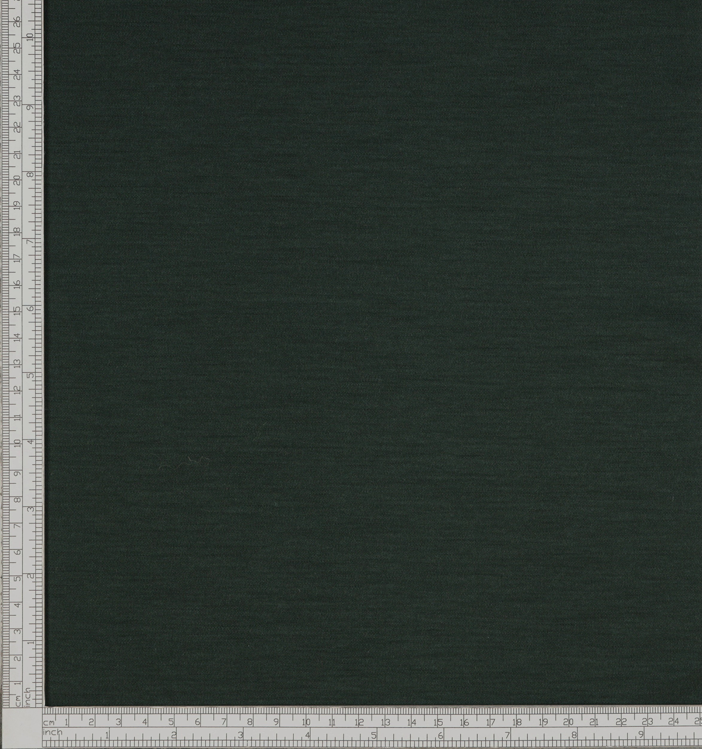 Solid colour dark green jersey wool fabric