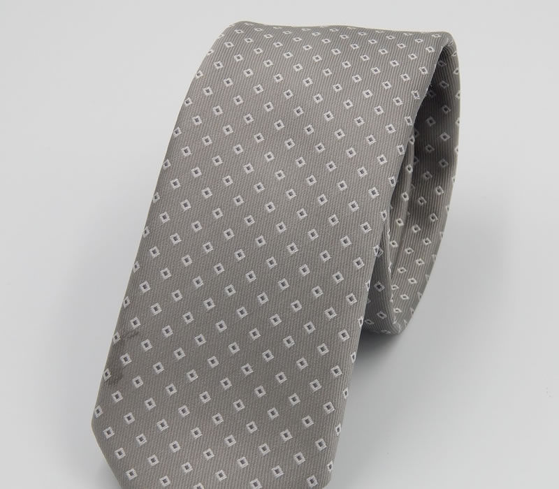 Cravatta artigianale 100% seta colore grigio con motivi bianchi